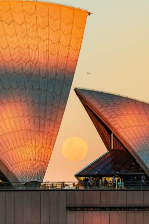 Moon alignment between sails of Sydney Opera House